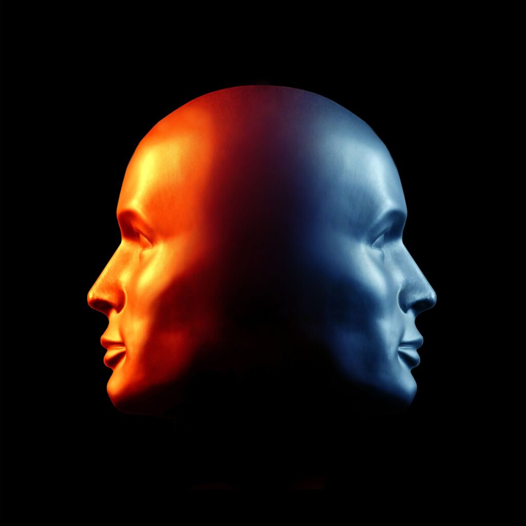 two faces colored orange and blue